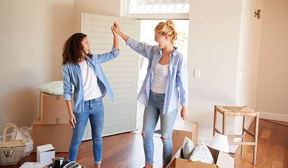 Photo of a high five while packing